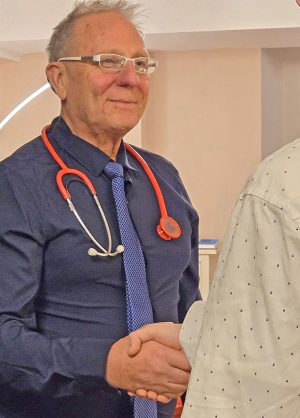 prof-muss-handshake prof-muss-handshake